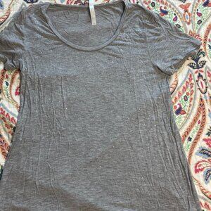 Grey top with silver glitter details, soft and streachy